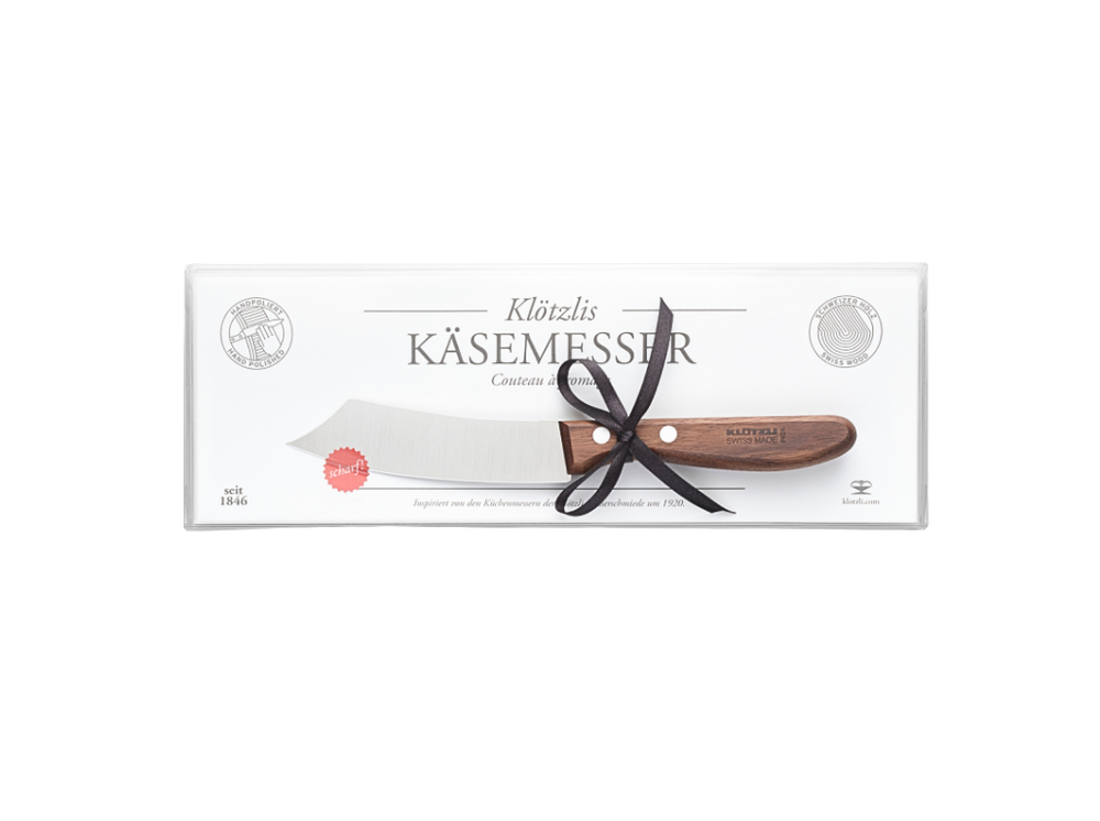 Confezione Coltello da formaggio Klötzli con lama in acciaio inox e manico in legno di noce svizzera.