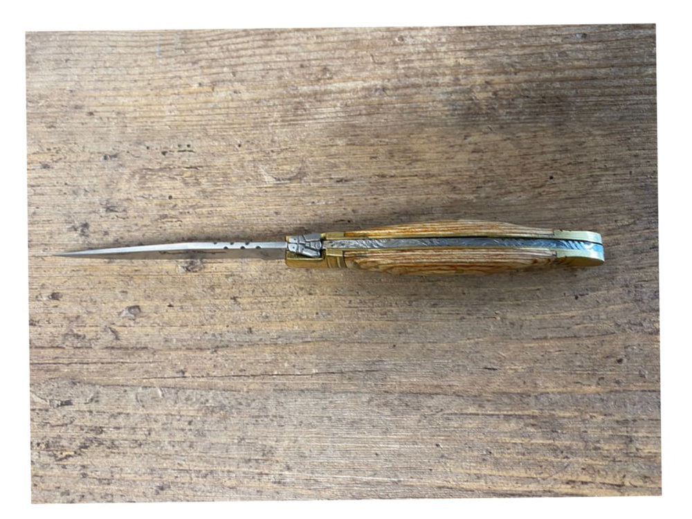 Laguiole Bougna con manico in legno chiaro - Caola